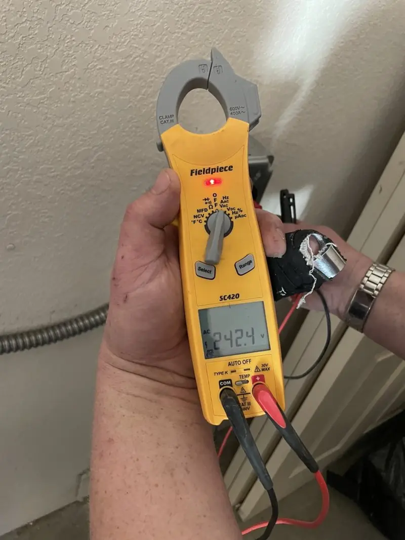 Voltage testing with clamp meter during Aluminum Wiring Replacement in Richardson